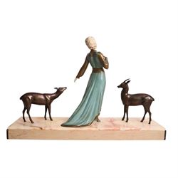 Art Deco painted spelter figure group, a lady and two deer, upon a rectangular marble base, signed Roggia, H44cm