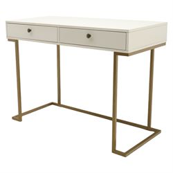 Modern white dressing table, rectangular top above two frieze drawers with bronze metal handles, upon square metal supports