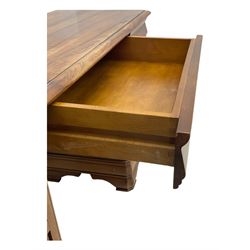 French cherry wood kneehole desk or dressing table, moulded rectangular top over twin pedestal bases each housing three drawers with brass-effect swing handles, resting on bracket feet