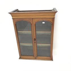  Victorian mahogany bookcase, two arched glazed doors enclosing two shelves, W83cm, H108cm, D39cm  