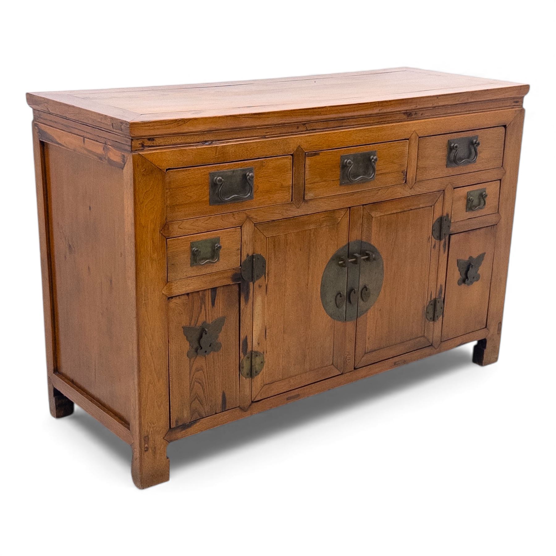 Late 20th-century Thai elm sideboard fitted with an arrangement of three drawers over a central cupboard flanked by a further two drawers, raised on square post feet 