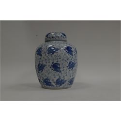 Blue and white ginger jar, decorated in a repetitive pattern of fish swimming amongst dense clusters of aquatic foliage, H40cm