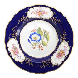 Collection of 19th century porcelain dessert wares, comprising Bloor Derby dish, circa 1825, Spode Felspar shaped oval dish, circa 1820, Ridgeway shaped oval footed dish with twin handles, circa 1840, Ridgeway dish, circa 1820, and tazza and dish, probably Minton, pattern 4810, each decorated in various patterns with floral sprays against dark blue grounds and heightened with gilt