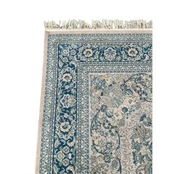Persian Nain design pale pink and blue ground rug, decorated with scrolling foliage and flower head motifs