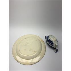 Early 19th century David Dunderdale & Co Castleford pottery plate, decorated in brown in the Buffalo and Ruins pattern, with indistinct impressed marks beneath, D24cm, together with a late 18th/early 19th century blue and white pearlware sauce boat, decorated in a variant of the Willow pattern, L15cm