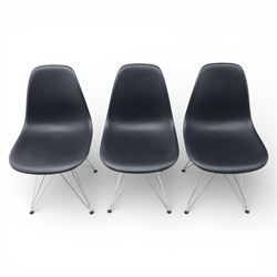Vitra - set of six DSR side chairs designed by Charles and Ray Eames, moulded black plastic seats, raised on chromed wire Eiffel bases with plastic foot glides