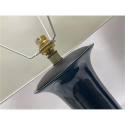 Pair of Chinese teal glazed table lamps, each of bottle form, raised upon circular hardwood bases, including shade H72cm 