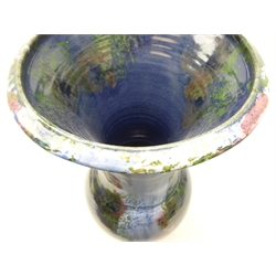  Eddie Curtis (British 1953-) large 1980s vase of baluster form with flared neck, with blue, copper and green glaze, impressed mark to base, H57cm   