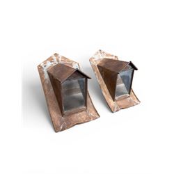 Pair of metal sloping roof lanterns with glazed windows