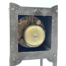 A German Arts and Crafts 'Gesamtkunstwerk' mantle clock c1890 in a square formed iron case with abalone incised triangles to each corner, case raised on four legs with inward facing feet,  convex copper chapter ring hand engraved with upright Arabic numerals, conforming copper hands in an individual style, with an eight-day spring driven rack striking movement manufactured by Lenzkirch, striking the hours and half hours on a bell, conforming steel pendulum with a hand-crafted faceted pear-shaped copper bob. With key.
Lenzkirch were one of the most prolific and respected German clock manufacturers of the 19th and early 20th century, it is highly probable that this movement was removed from another clock and incorporated into this artisan case when made at the end of the 19th century.