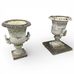 Pair of large stone Campana urns on square bases