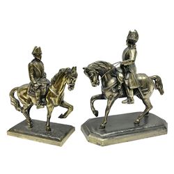 Two figures of Napoleon on horseback, one example standing on octagonal bases marked 'G R France' indistinctly signed, the other on a rectangular base, H19cm 