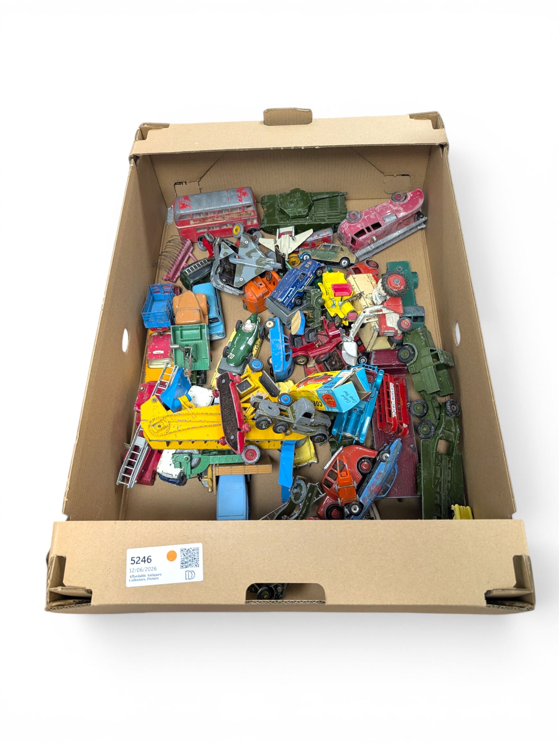 Collection of diecast model vehicles, including Dinky and Corgi examples, mostly loose and playworn