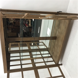 'Foxman' large oak and glazed display cabinet, two doors enclosing three glass shelves and mirrored back, by Don Craven of Oldstead, Thirsk, W154cm, H169cm, D47cm
