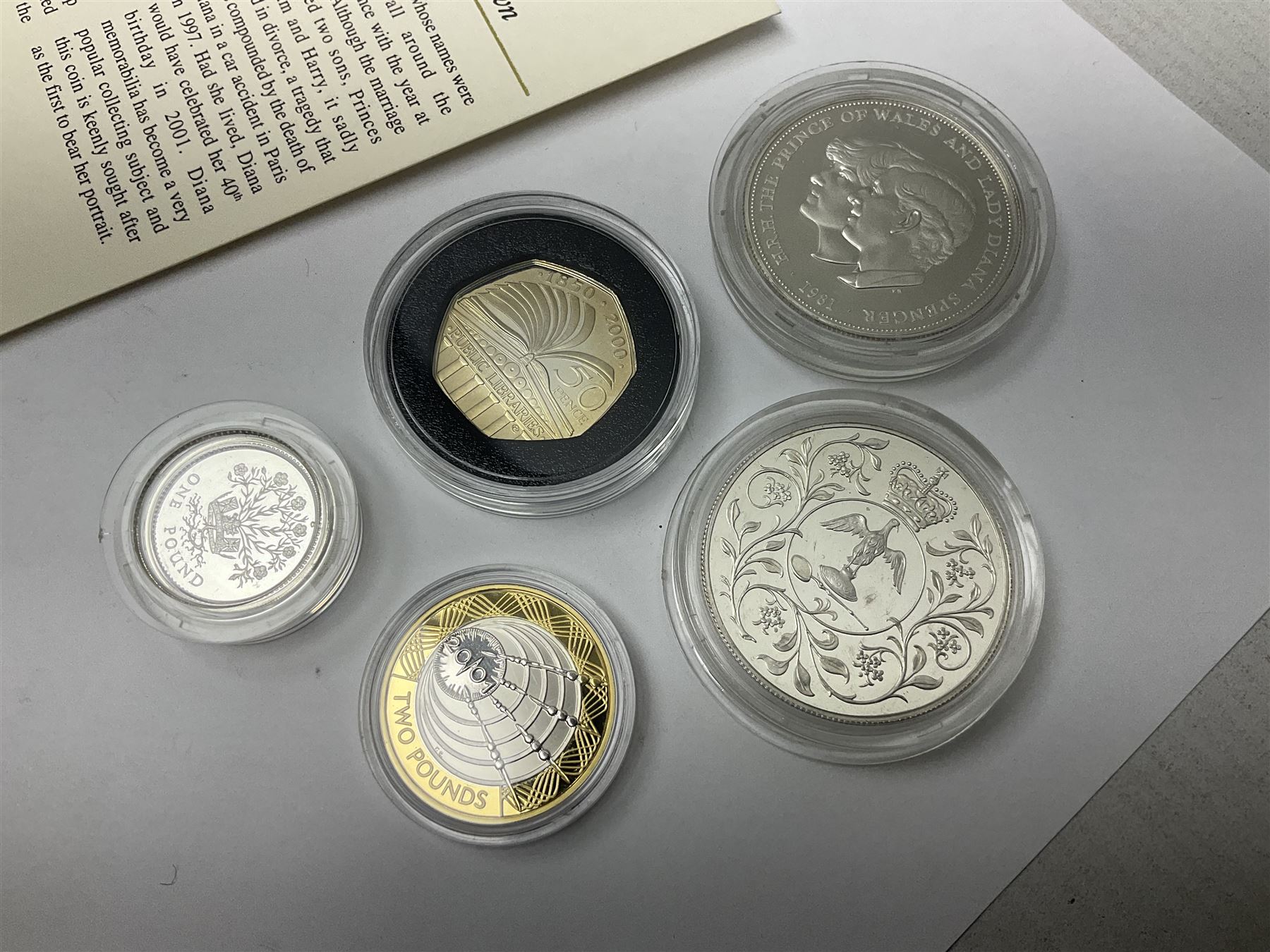 Five Queen Elizabeth II silver commemorative coins comprising 1977 Silver Jubilee crown, 1981 Royal Wedding crown, 1986 Northern Ireland one pound coin, 2000 '`50th Anniversary of Public Libraries' fifty pence coin, and 2001 'Marconi Wireless Transmission' two pound coin