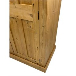 Traditional pine double wardrobe, fitted with two panelled doors