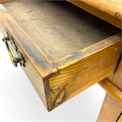 Rustic pine twin pedestal desk, rectangular green leather inset top above a central frieze drawer flanked by two short drawers, each pedestal featuring three graduated drawers, raised on a plinth base