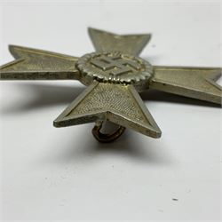 German War Merit Cross 1st Class, the pin-back stamped '50'; War Merit Medal; and Ostfront Medal for the Winter Campaign in Russia of 1941-1942 'Die Medaille Winterschlacht Im Osten'; all with ribbons (3)