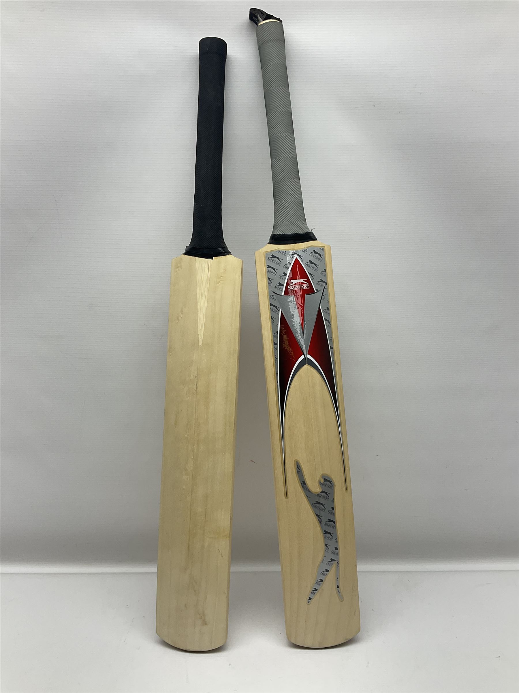 Two signed Yorkshire County cricket bats, from 2007 and 2008 seasons, bearing signatures including Darren Gough, Jason Gillespie, Younus Khan, Michael Vaughn and Tim Bresnan, etc