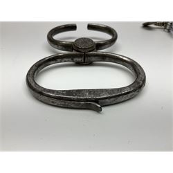 Police - two pairs of steel nipper handcuffs, one stamped Hull City Police; two other chromium plated Hiatt steel nipper handcuffs, each stamped HCP (?Hull City Police); and a pair of chromed steel articulated handcuffs stamped WRC (?West Riding Constabulary) (5)