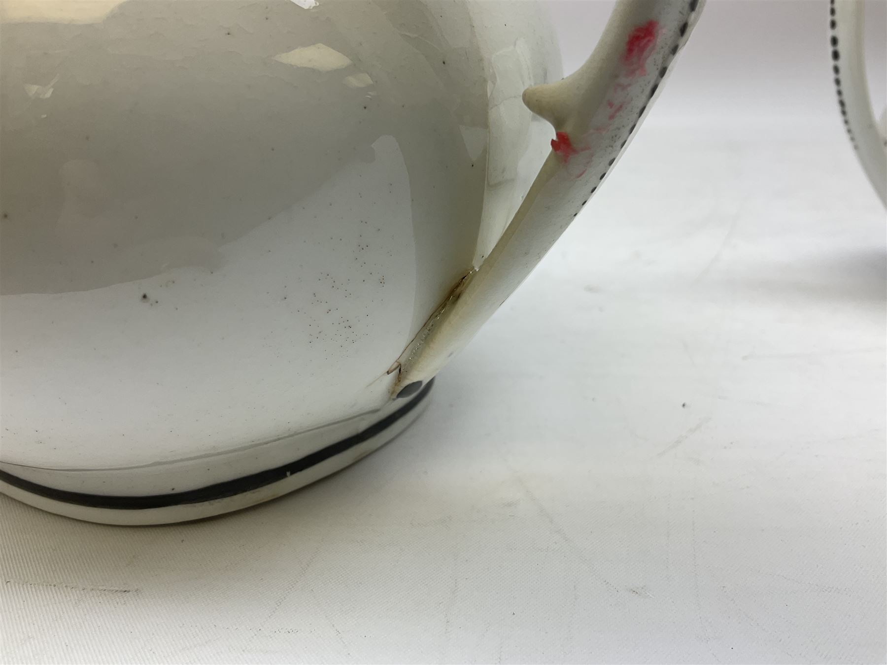 Early 19th century Staffordshire bat printed part tea service, decorated in black after Adam Buck with scenes of mother and child and other varying classical style scenes, within black bands, comprising teapot, slop bowl, jug, seven teacups and five saucers 