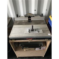 Ryobi router table with router, dewalt biscuit joiner with biscuits, joiners books, clamps etc  - THIS LOT IS TO BE COLLECTED BY APPOINTMENT FROM DUGGLEBY STORAGE, GREAT HILL, EASTFIELD, SCARBOROUGH, YO11 3TX