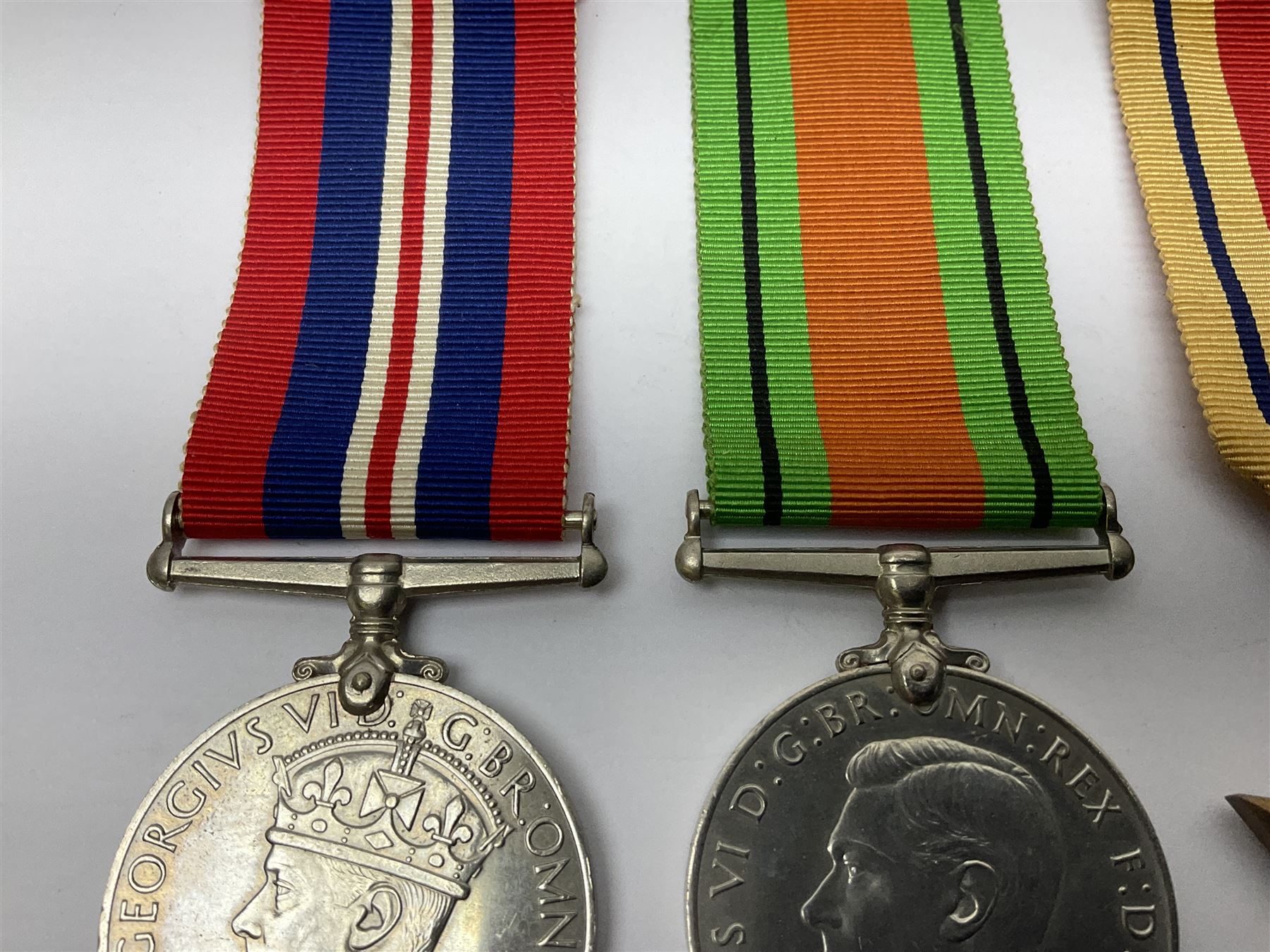 Group of five WWII medals comprising 1939-45 War Medal, Defence Medal and Italy, Africa and 1939-45 Stars; all with ribbons (5)