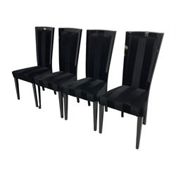 Set of four contemporary ebonised high back dining chairs, upholstered in black velvet fabric