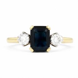 18ct gold sapphire and diamond three stone ring, single octagonal cut sapphire of approx 0...