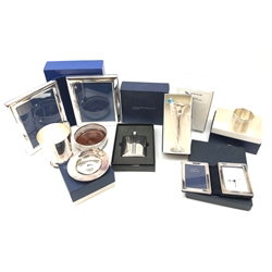  Ex-retail - Collection of silver-plate by L R Watson: Tankard, double portrait folding photo frame, pierced coaster, Pheasant mounted pin dish, folding quartz clock with photo frame, trumpet vase, Celtic design hip flask and octagonal vase, with original boxes (8)  