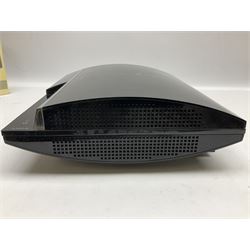 Sony PlayStation 3 60GB console with one PS3 controller, two PS2 controllers, BD remote control, PSP handheld gaming console with case, GAMEware PSP essentials pack, and a selection of PS2, PS3 and PSP games in original cases with instruction booklets 