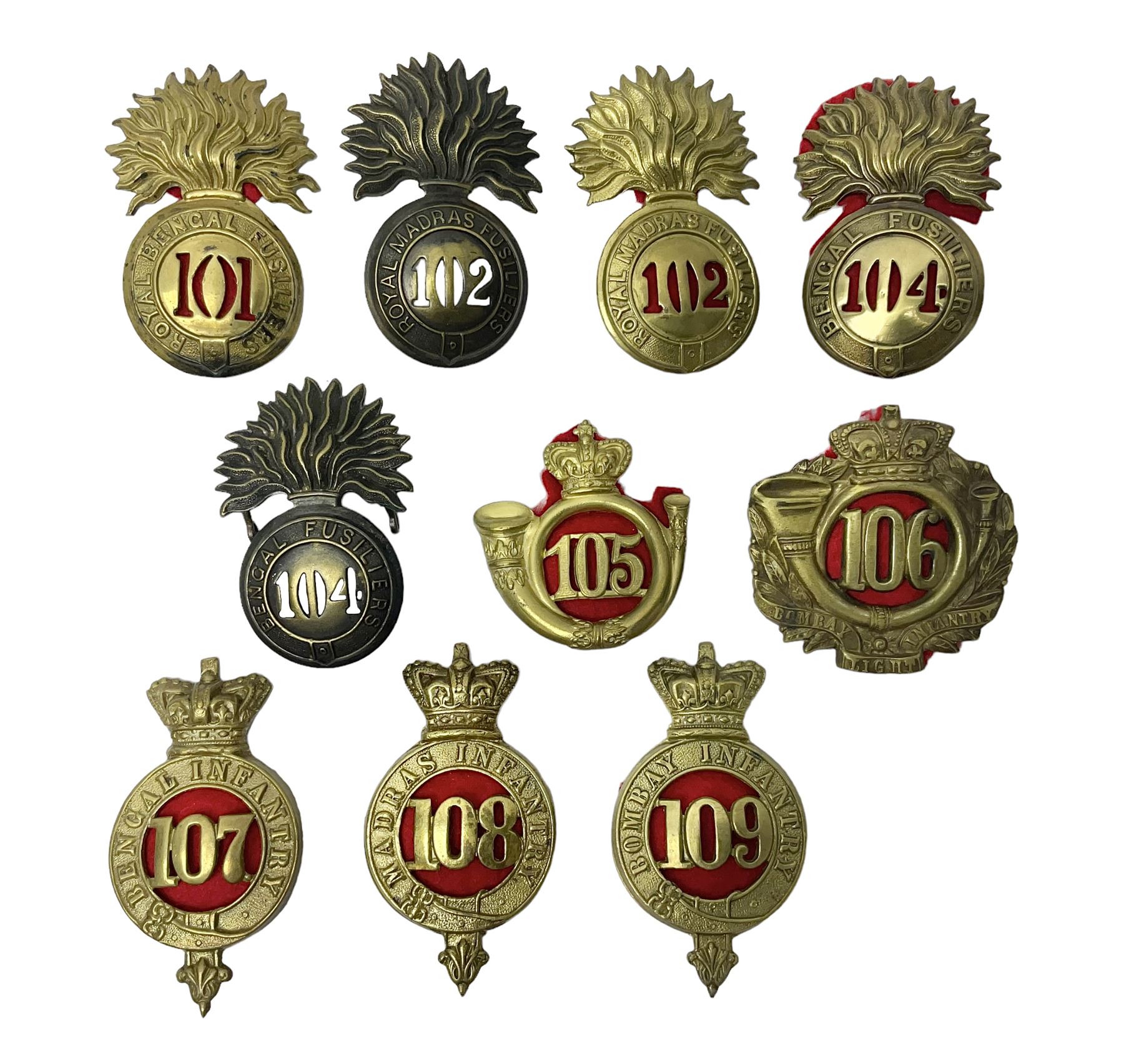 Ten cap badges of Indian interest comprising Bengal Fusiliers No.104, Bengal Infantry No.107, Royal Bengal Fusiliers No.101, Bombay Infantry No.109, Bombay L.I. No.106, two Royal Madras Fusiliers No.102, Madras Infantry No.108 and Madras L.I. No.105 (10)