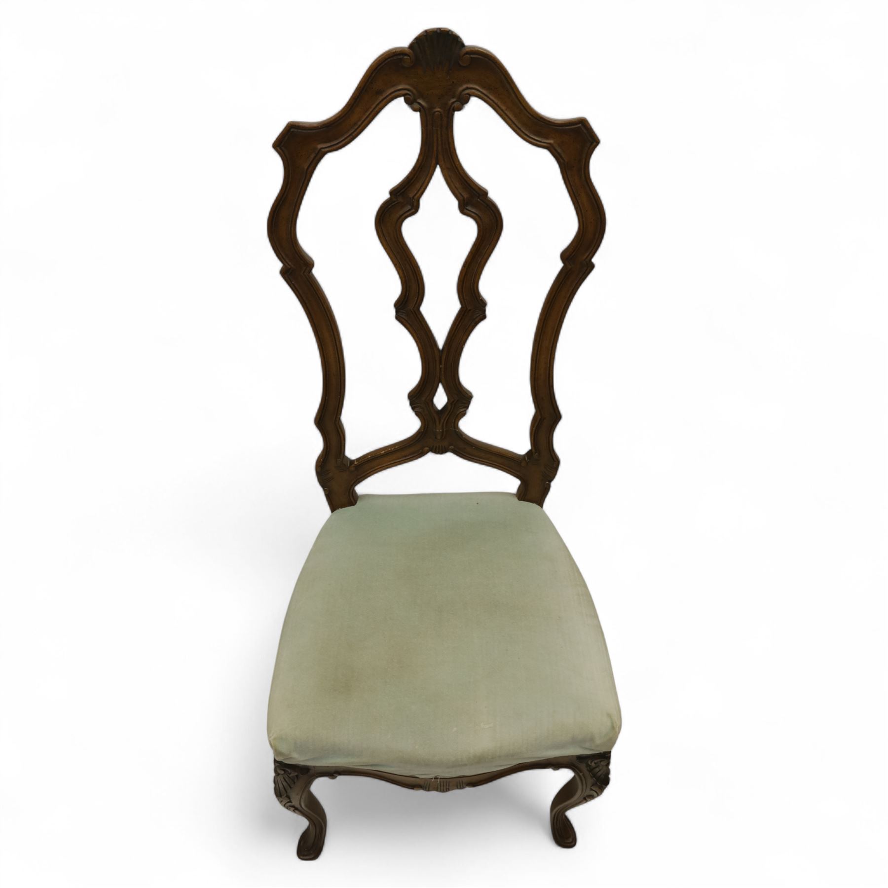 20th-century set of four French provincial-style stained beech dining chairs, pierced cartouche back with fan carving, with a scroll moulded frame above a padded serpentine seat on cabriole legs 