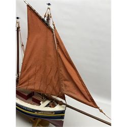 Wooden model of the Peterhead Herring Fishing Boat, Love Divine, PD404. on stand together with Wick Herring Fishing Boat, Galilee WK.1. on stand, L105cm, H64cm