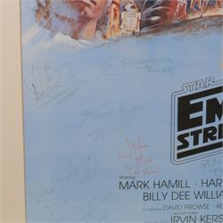 Autographed 1980s Star Wars Empire Strikes Back movie poster, with artwork by Tom Jung, with signatures including Michael Sheard (Admiral Ozzel), Koo Stark, Caroline Blakiston (Mon Mothma), Shelagh Fraser (Aunt Beru), Mike Edmonds (Logray), Peter Mayhew (Chewbacca), Jeremy Bulloch (Boba Fett), Stuart Freeborn (Creature Designer), Warwick Davies (Wicket), Michael Carter (Bib Fortuna), Dave Prowse (Darth Vader), Kenny Baker (R2D2), signatures and poster obtained at the Dave Prowse Promotions Mulitcon Event 1998 at The Norbreck Caste Hotel, Blackpool, in glazed black frame, frame H115cm