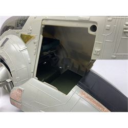 Star Wars - three space vehicles comprising B-Wing fighter and large Millenium Falcon space ship; both with instructions; and Boba Fett Slave 1; all unboxed (3)