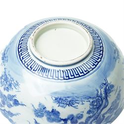 Japanese blue and white bowl, the central bowl painted with bird, surrounded by a border of trees, unmarked, D31cm 