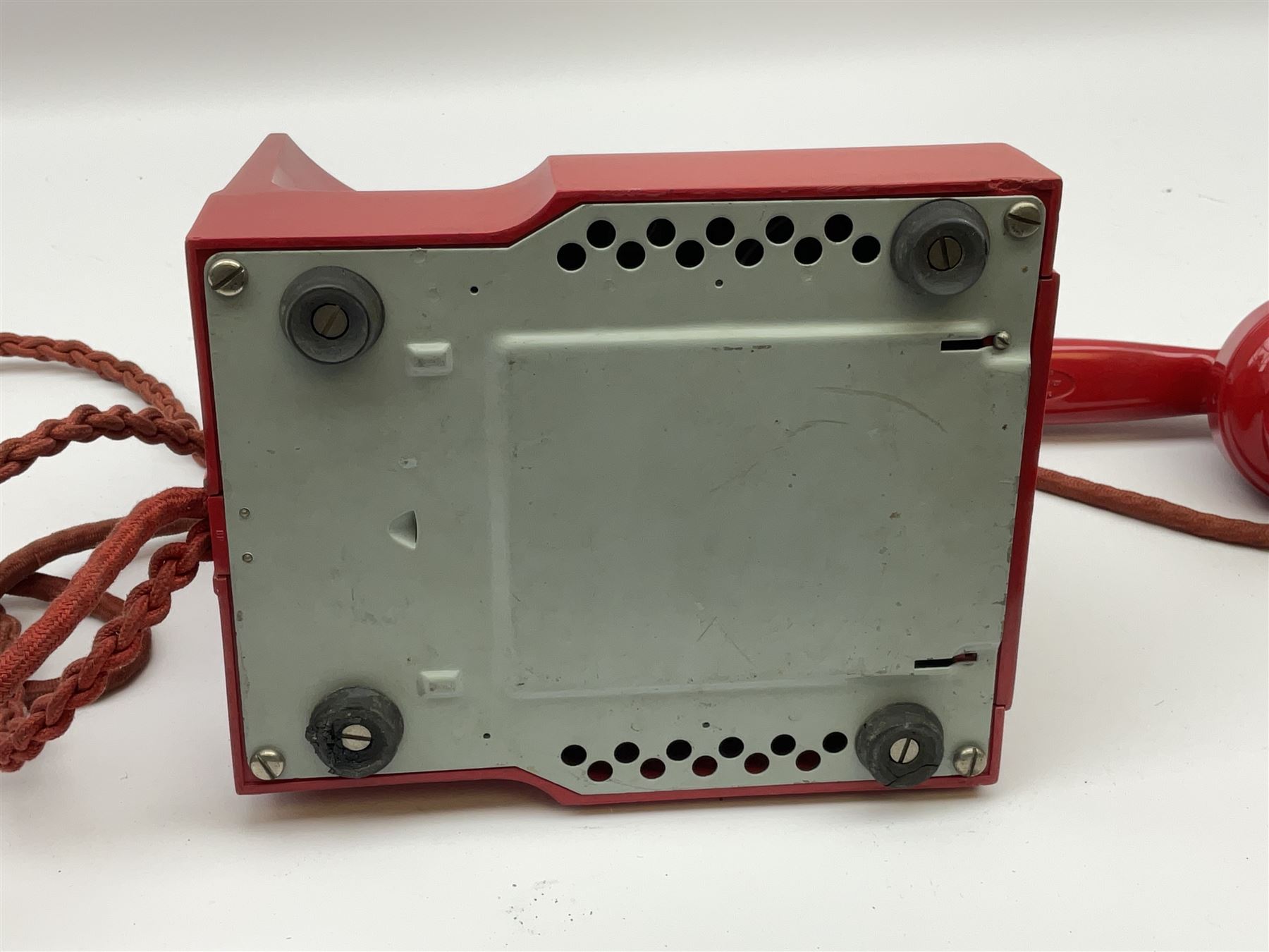 1950s Siemens Brothers red telephone with chrome rotary dial with enamel number plate and Siemens dial label, model 356, the body with base drawer below gilt logo, the handset with impressed mark PAT. 328926 PAT. SA 9/30, with red braided cord and red junction box (detatched), W15cm D18.5cm H14cm