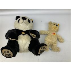 Two Steiff 'Cosy Friends' stuffed animals comprising 'Charly' teddy bear, serial no. 012808, together with Steiff 'Manschli' Panda no. 064821, both with Steiff button to ear with red and yellow tag and original Cosy Friends tags