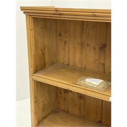 Small wall mounted pine bookcase, fitted with two fixed shelves 