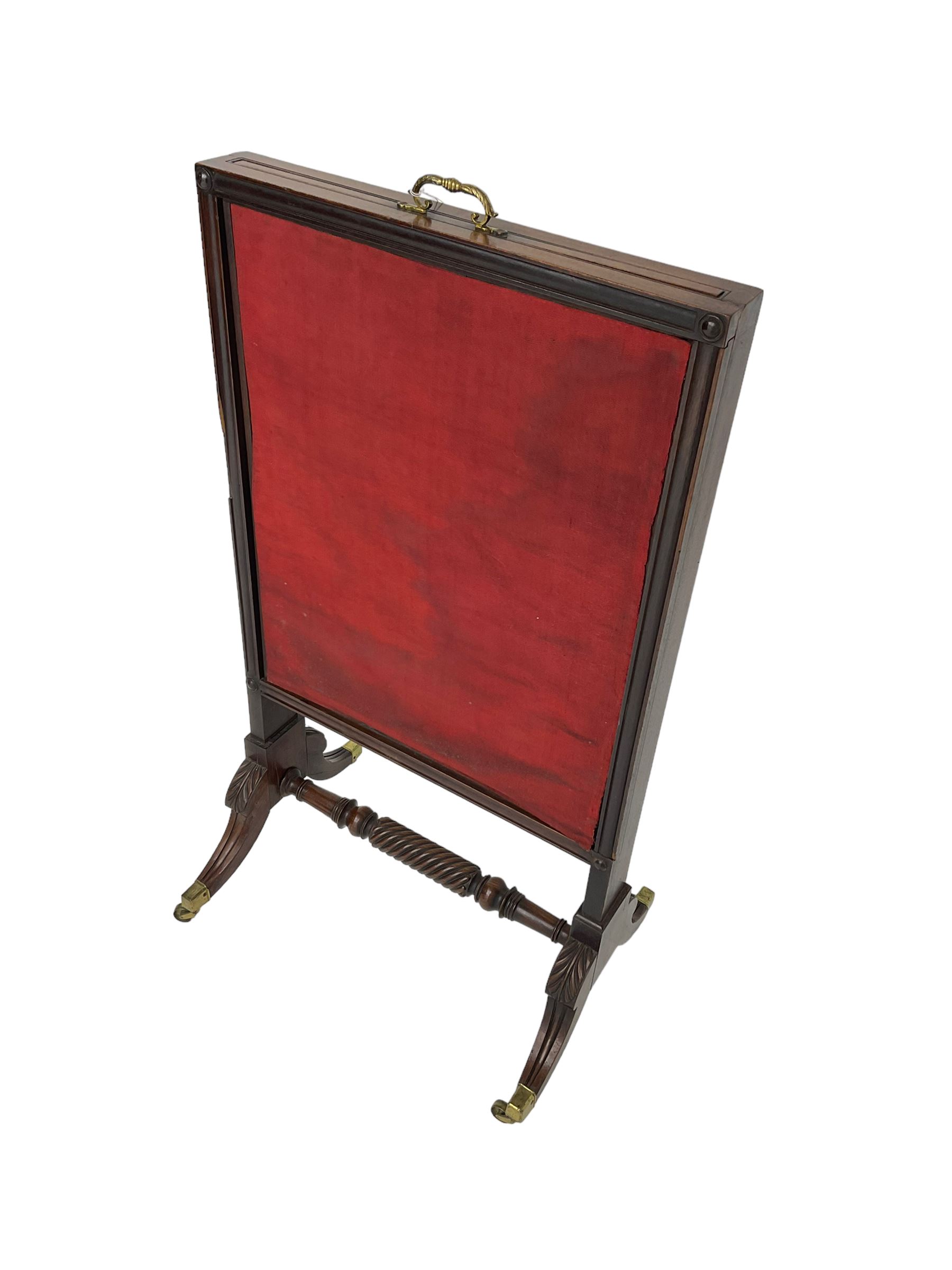 Regency mahogany screen with two horizontal and one vertical pull-out panels, on base with carved sabre legs and rope-twist stretcher