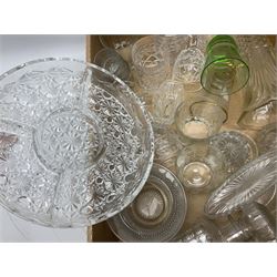 Large quantity of glassware, to include cut, coloured and moulded examples, drinking glasses, jugs, vases, bowls etc in five boxes