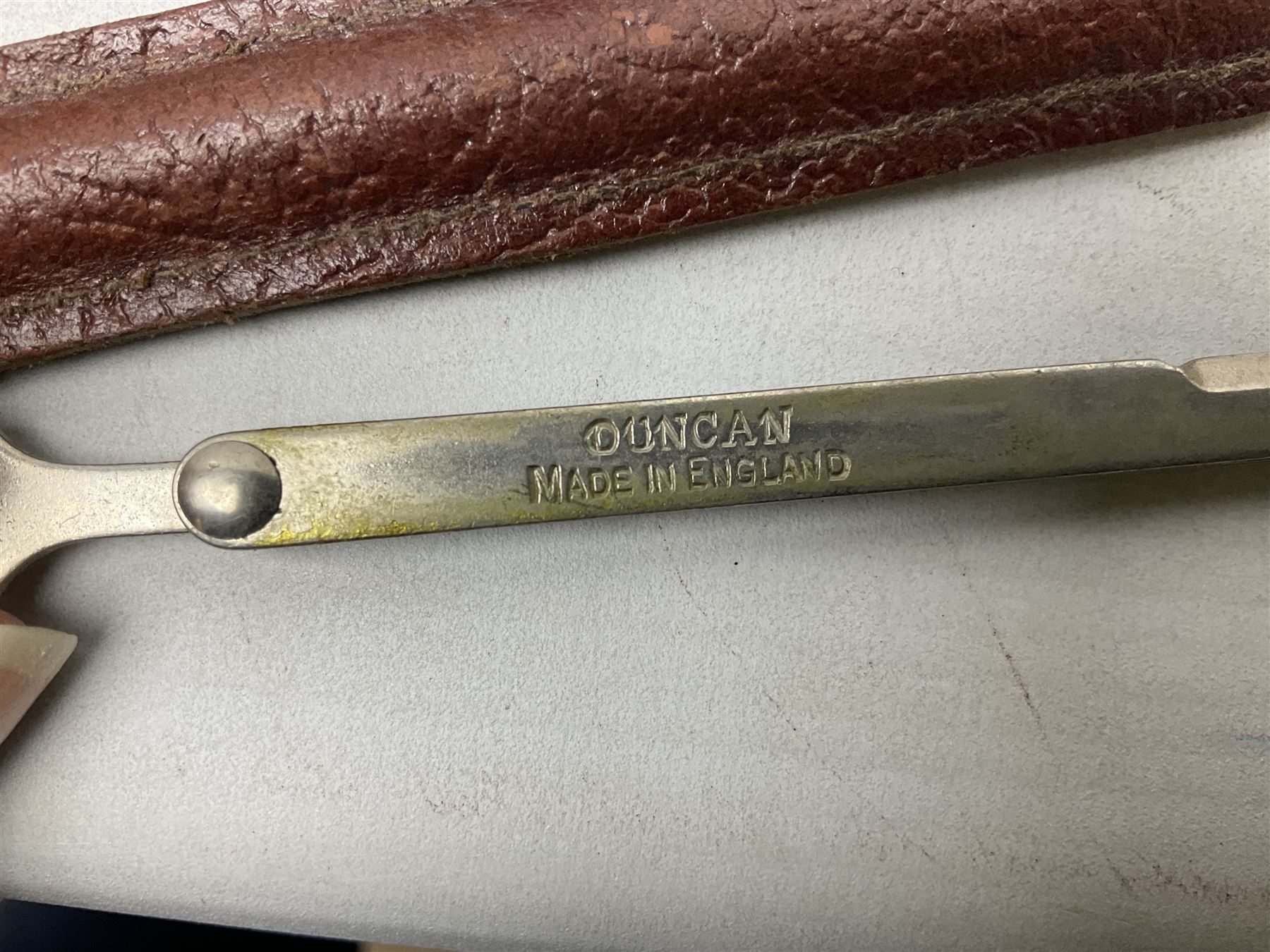 Miscellaneous militaria including two Royal Artillery and one Royal Horse Artillery stable belts; Northamptonshire Regiment trench art brass shell case lighter; unused Matchless Fire-Set; pocket knives and multi-tool; lanyards; oak shield with York & Lancaster crest etc