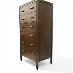 Edwardian tall oak chest fitted with six long drawers, on stile supports