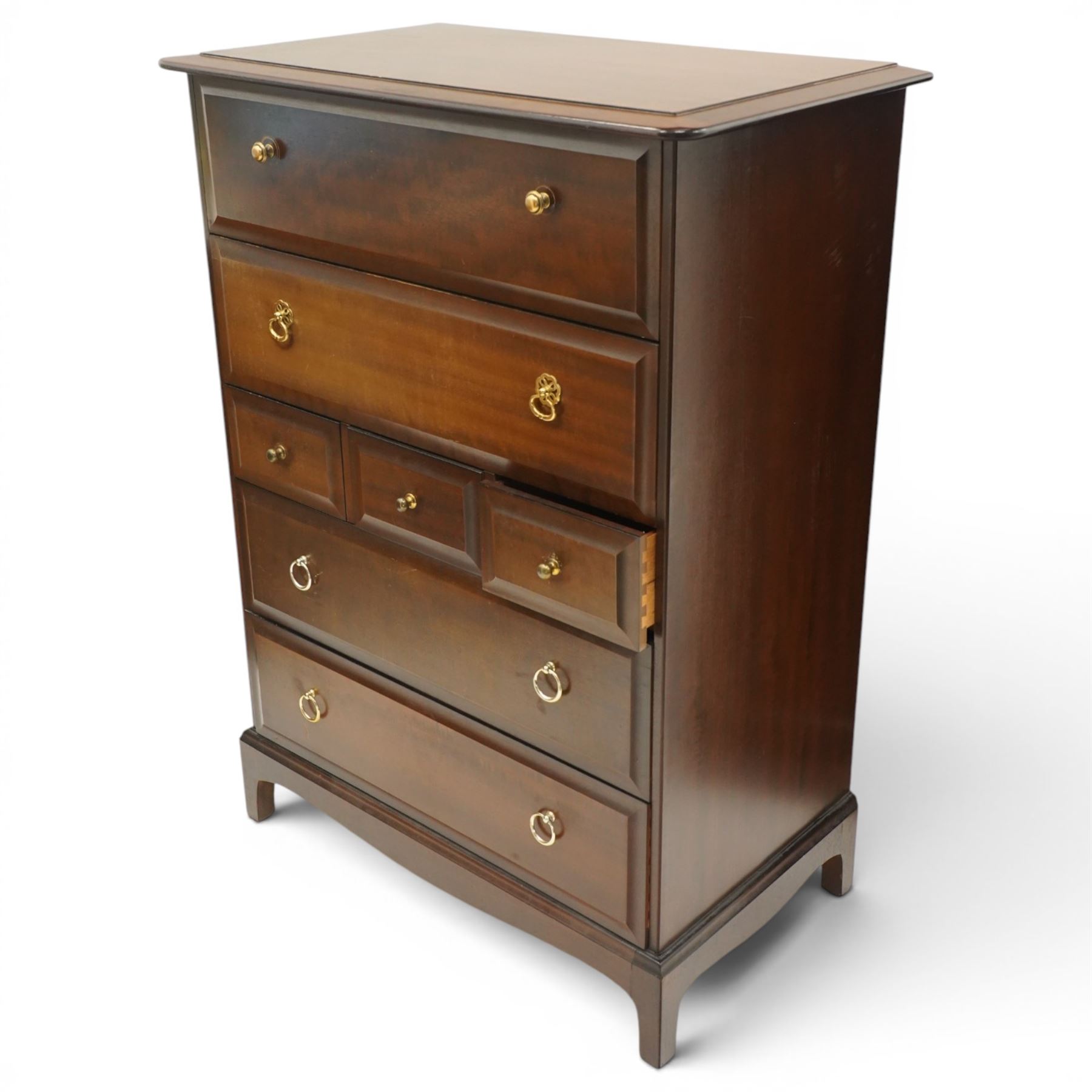 Stag Minstrel - pair of mahogany combination chests, fitted with an assortment of seven drawers with brass ring and pull handles, on bracket feet