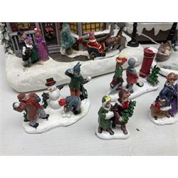 Christmas decorations; Premier LED Christmas Village scene with moving train, together with three Lumineo christmas scenes, and other similar 