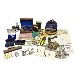 Two Swarovski swans, cased manicure set, 'Vogue' compact, nutcrackers with lion mask decoration, vesta case in the form of a book, ephemera relating to The Royal Family, small number of stamps in packets and on album pages, costume jewellery etc