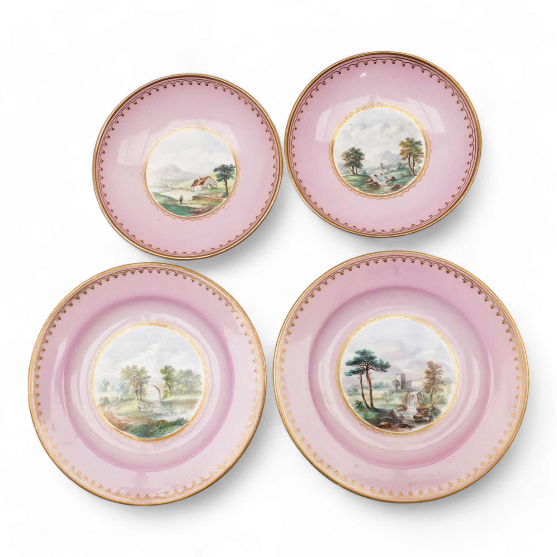 Two porcelain trios by James Bell, Glasgow, each painted with panels of Scottish landscapes, within gilt borders on pink ground, Newhall bute shape teacup, decorated in the Mother and Child pattern, Thomas Wolfe silver lustre teapot and circular dish, together with a Derby cup and saucer 