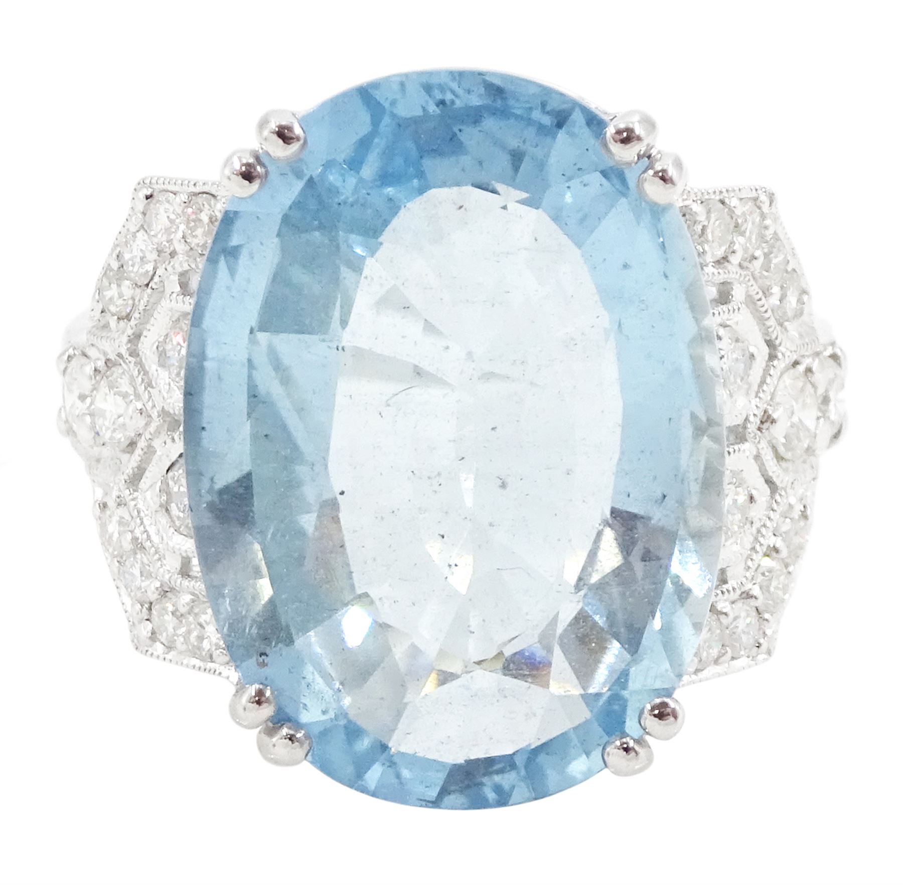 18ct white gold oval cut aquamarine ring, with milgrain set diamond, pierced design shoulders, stamp[ed 750, aquamarine approx 9.65 carat, total diamond weight approx 0.45 carat