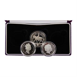 Queen Elizabeth II 2002 'The Accession Set' comprising United Kingdom five pounds,  Canada one Dollar and Australia fifty cents, cased with certificate